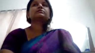Watch this beautiful Indian woman showing her huge assets and body on webcam with her husband